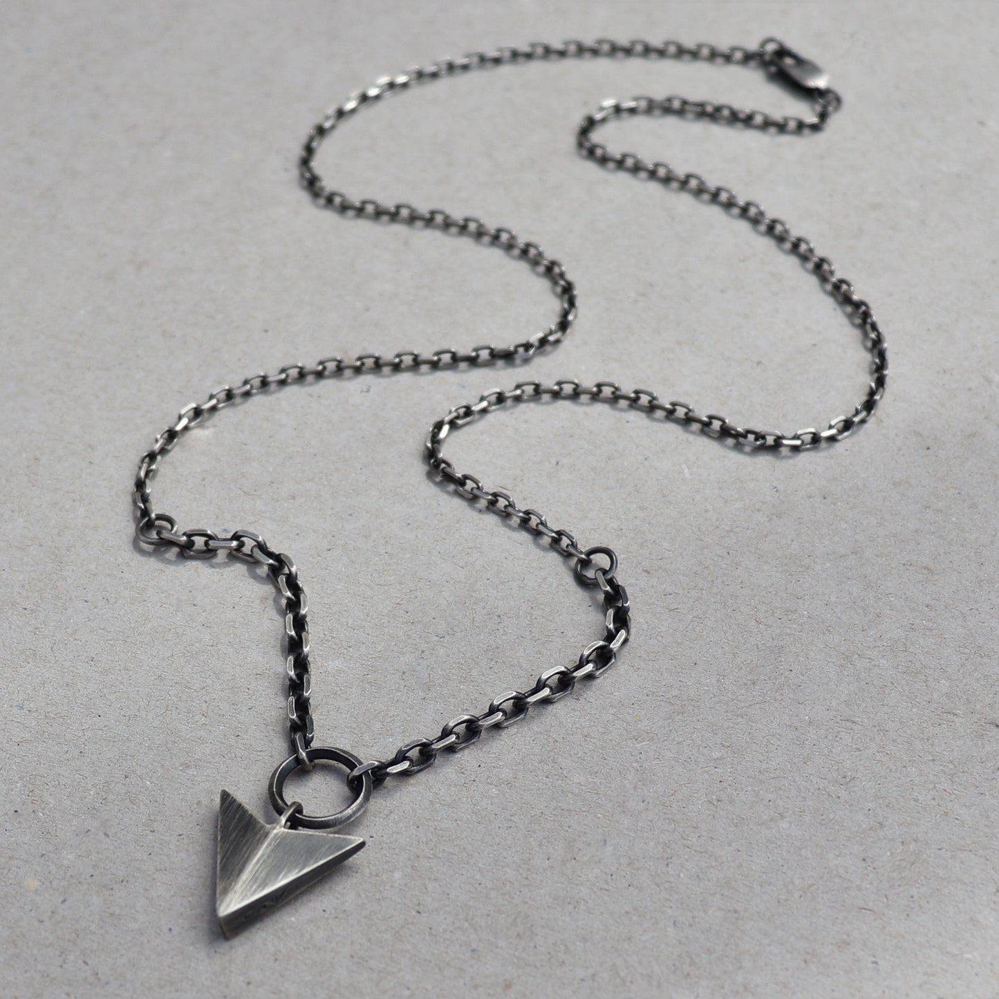 Oxidised solid silver large arrow pendant on two widths of diamond cut trace chain