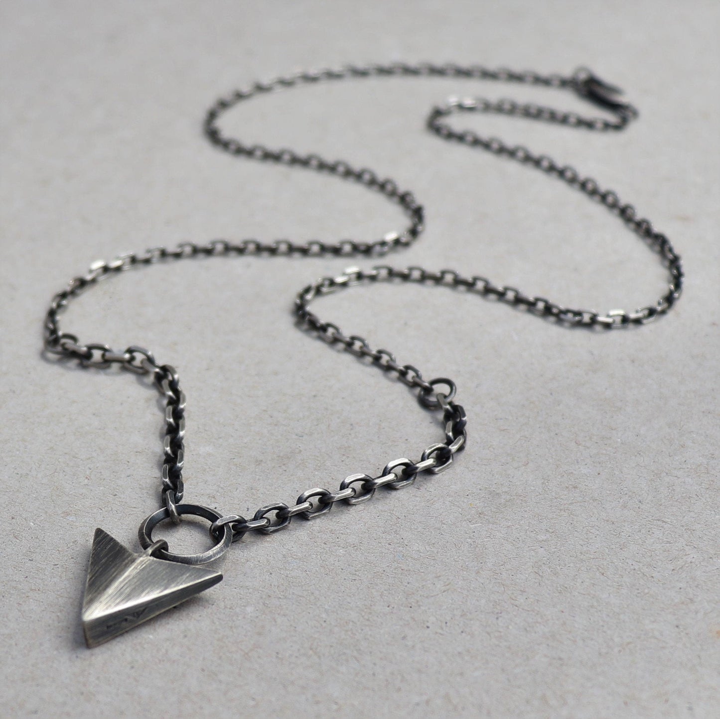 Oxidised solid silver large arrow pendant on two widths of diamond cut trace chain