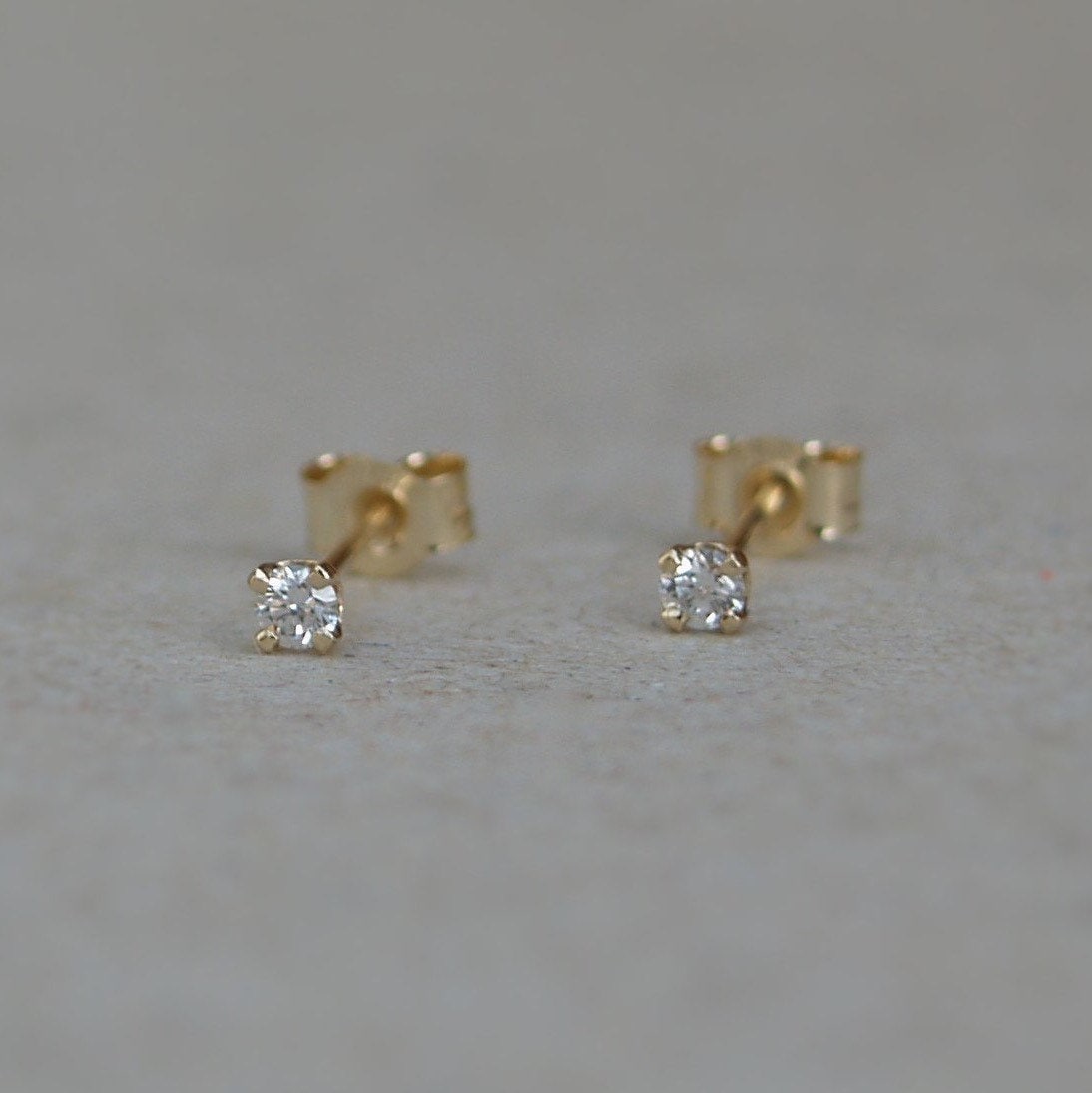 9ct yellow gold tiny 2.mm natrual diamond claw set stud earrings