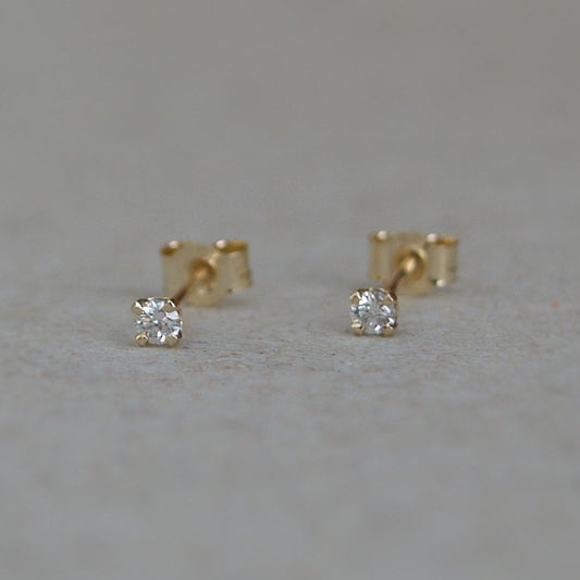 9ct yellow gold tiny 2.mm natrual diamond claw set stud earrings