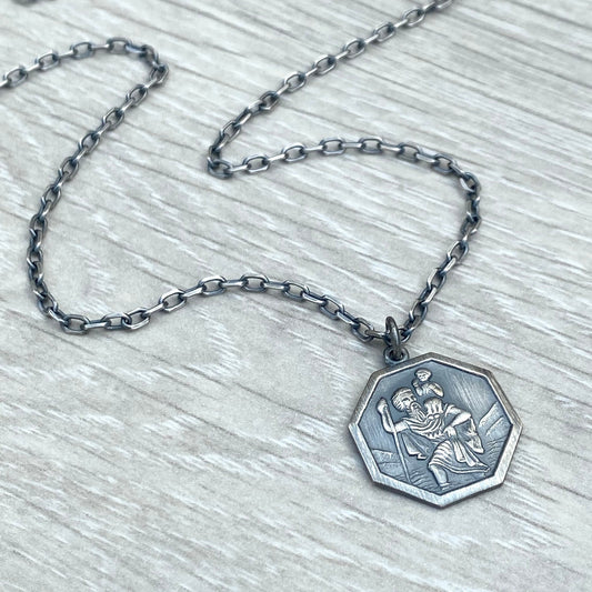 Oxidised or polished solid silver octagonal Saint Christopher pendant on a diamond cut trace chain