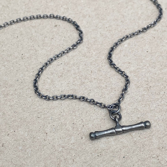 Oxidised or polished solid silver T-bar pendant on a trace chain