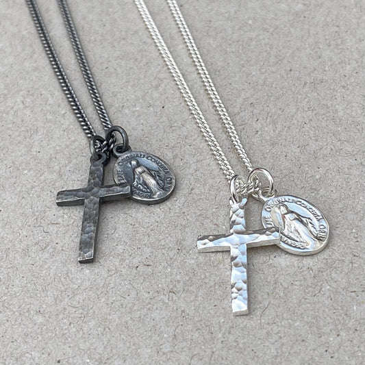 Oxidised or polished small solid silver hammered cross pendant and petite Miraculous Medal on a curb chain