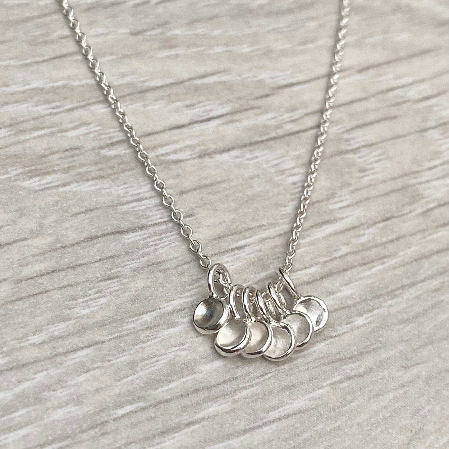 Handmade solid silver six tiny petal charm pendants on trace chain