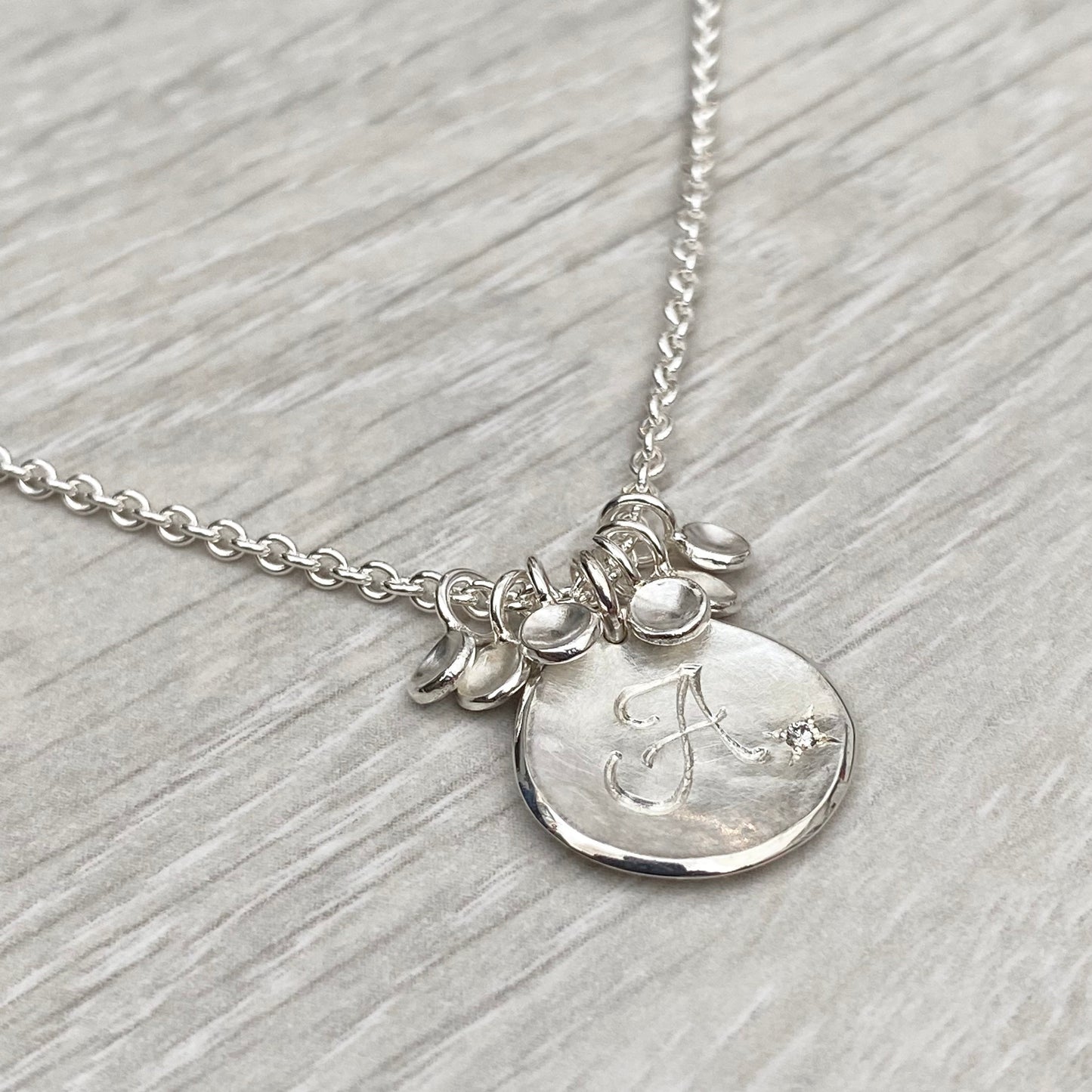 Handmade solid silver 16mm diamond petal charm pendants on a trace chain - Personalised with any letter