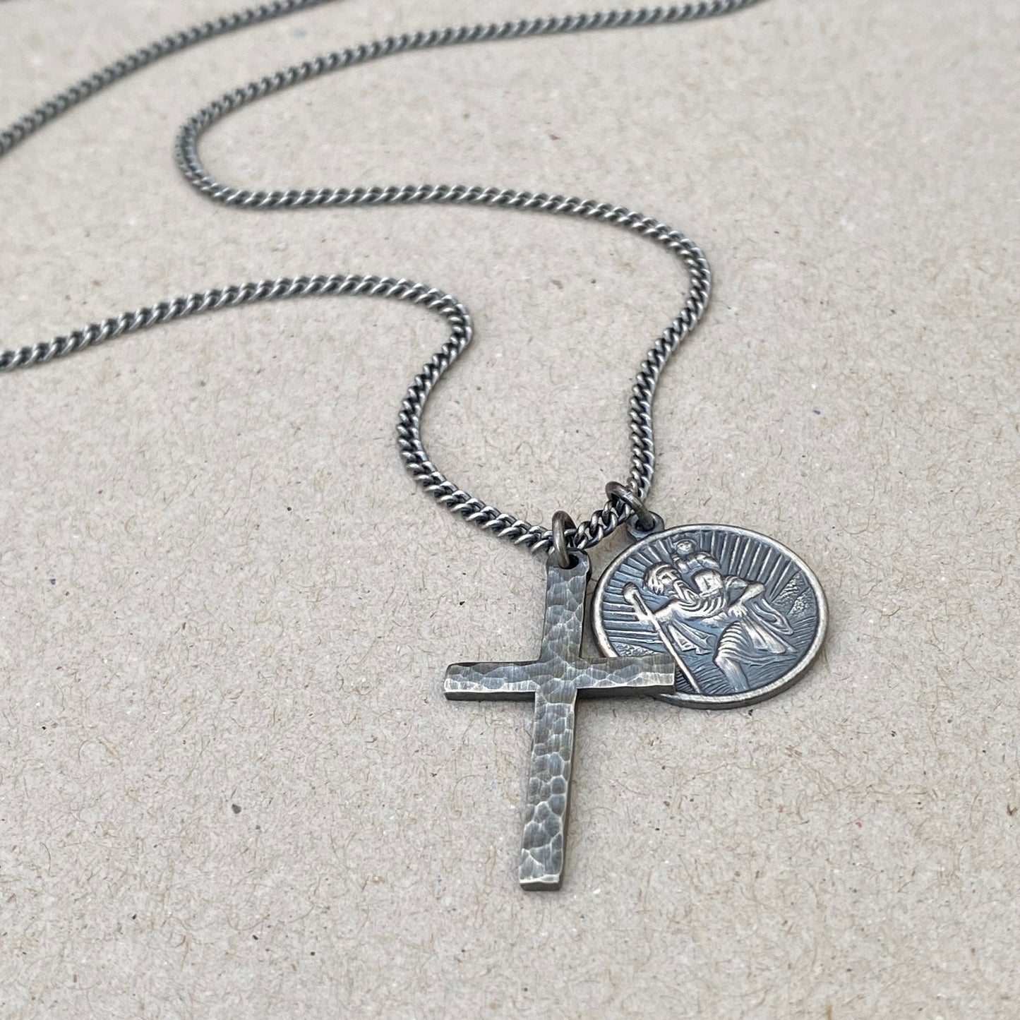 Oxidised or polished standard size solid silver hammered cross and round Saint Christopher pendants on a tight curb chain