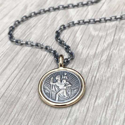 Oxidised solid silver round Saint Christopher 9ct yellow gold framed pendant on diamond cut trace chain