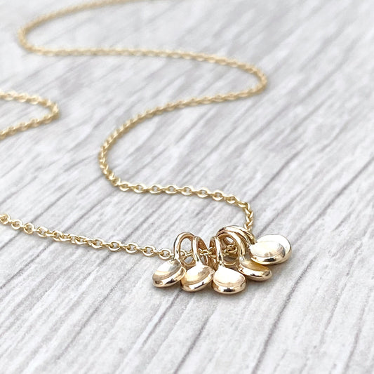 Handmade 9ct yellow gold six tiny petal charm pendants on a trace chain