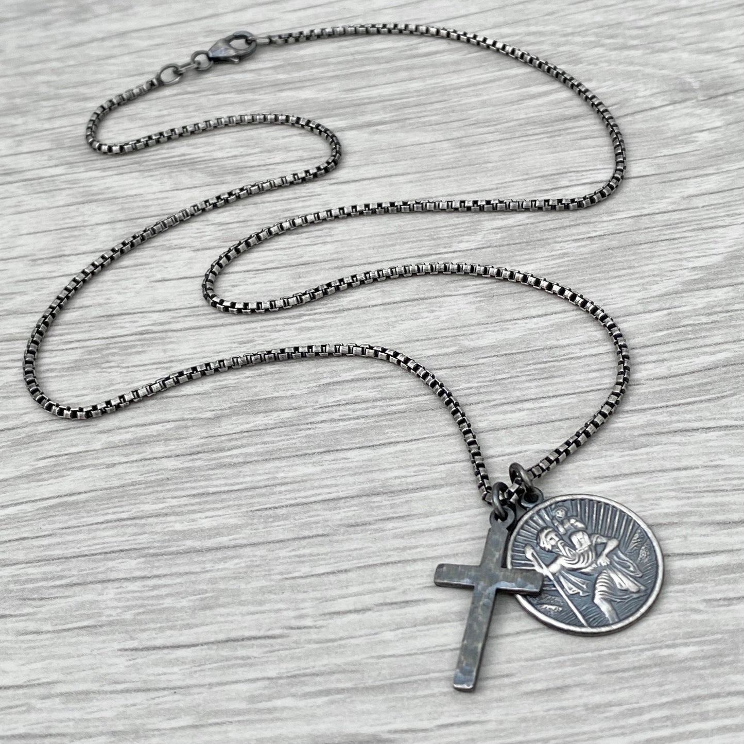 Oxidised or polished solid sterling silver round Saint Christopher and hammered cross pendant on round box belcher chain
