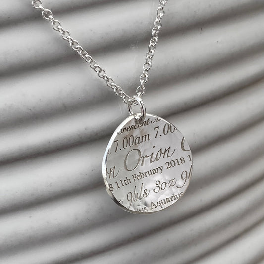 Handmade personalised solid silver 19mm baby birth charm details pendant on a trace chain