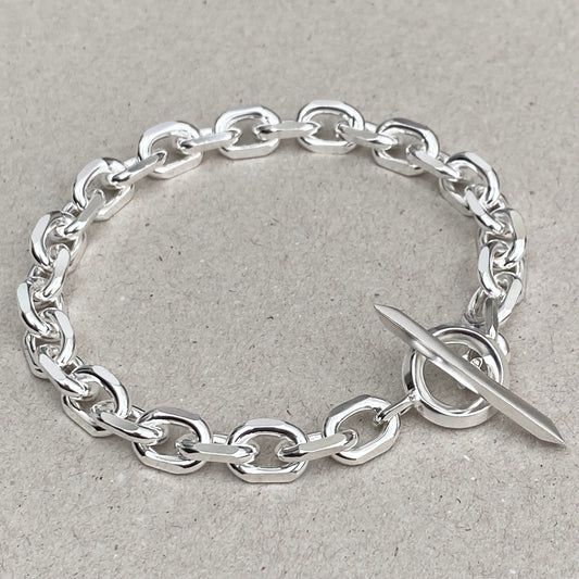 Oxidised or polished solid silver 8.5mm wide diamond cut trace chain bracelet with a unique T-bar design