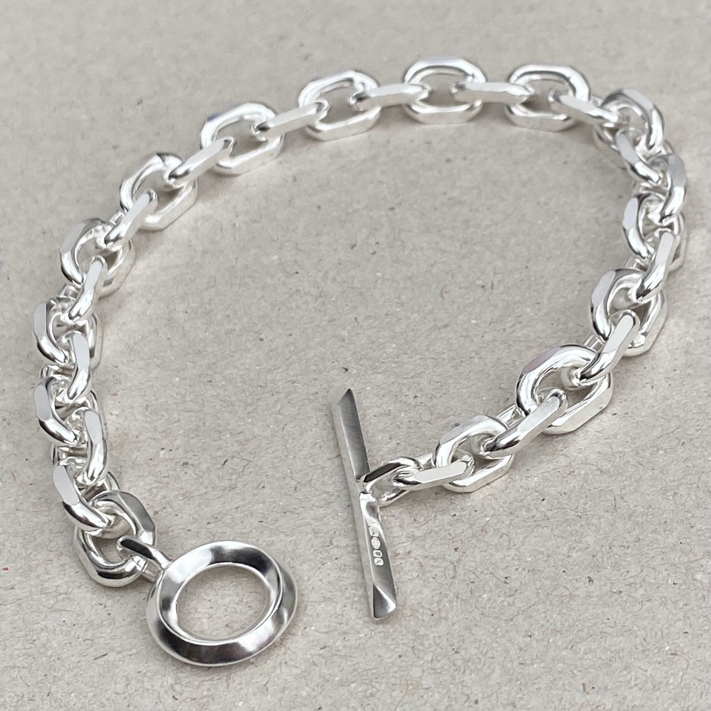 Oxidised or polished solid silver 8.5mm wide diamond cut trace chain bracelet with a unique T-bar design