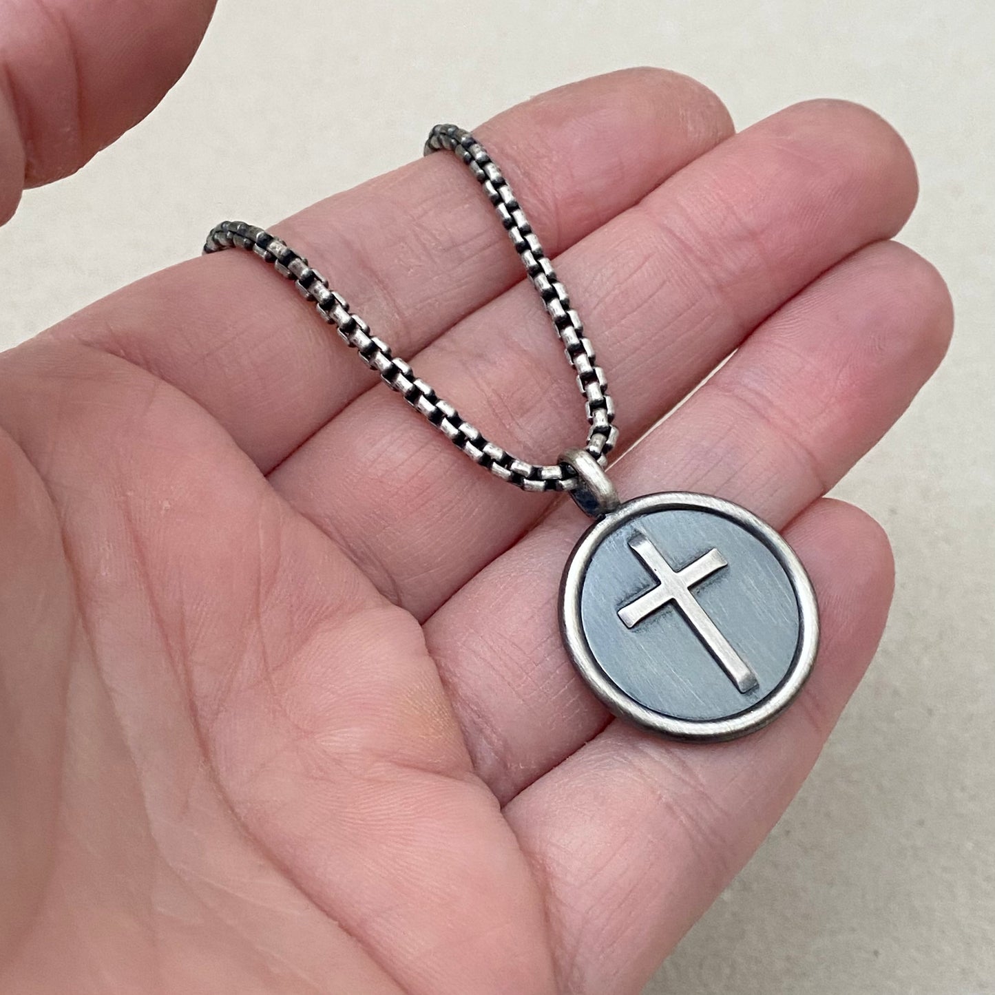 Oxidised solid sterling silver framed circle cross pendant on a box belcher chain