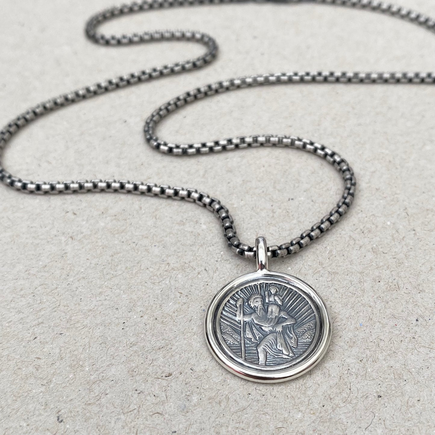 Oxidised solid silver Saint Christopher framed circle pendant on a 2.5mm wide round box belcher chain