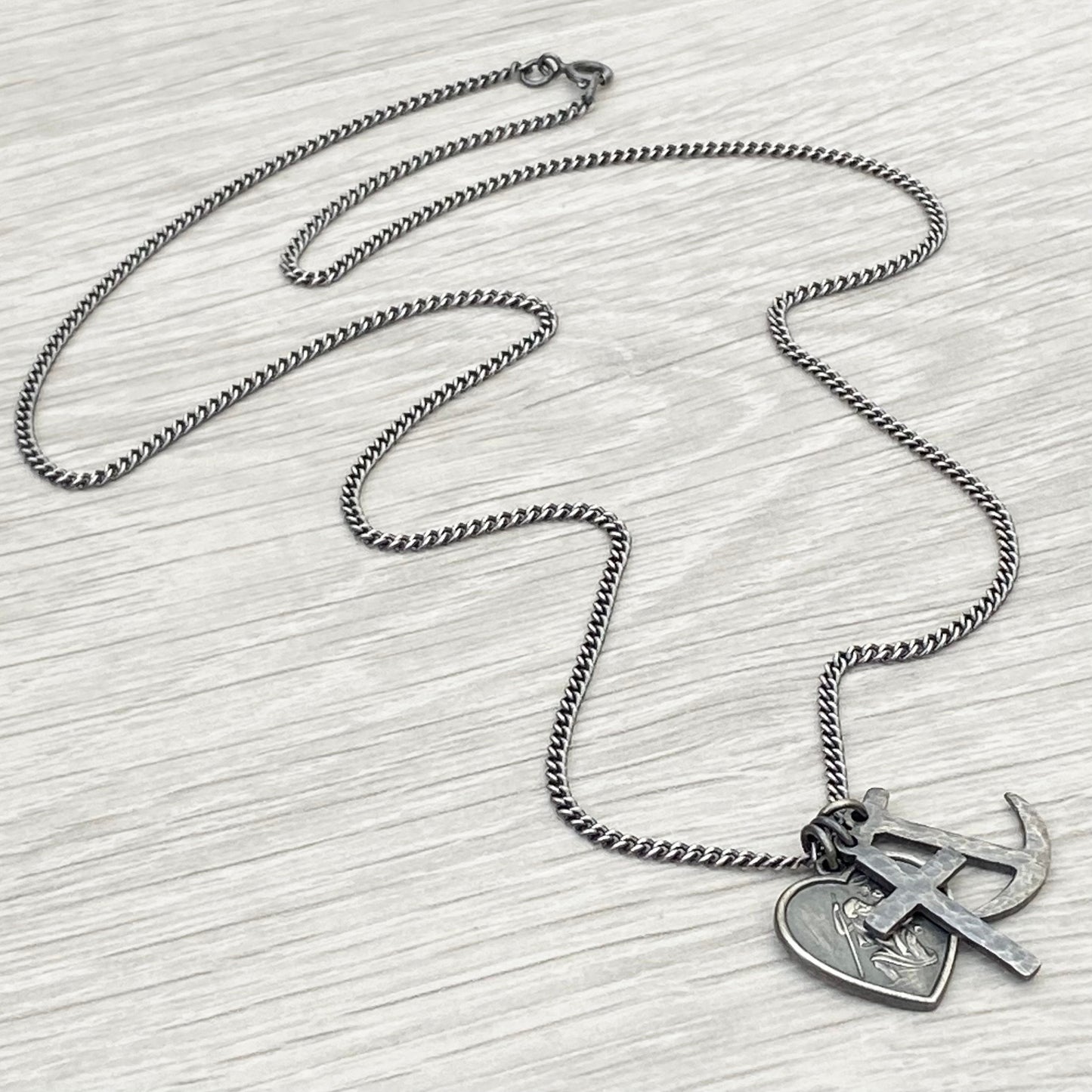 Oxidised or polished solid silver faith, love and hope charm pendants on a 2.1mm wide curb chain