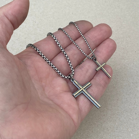 Oxidised solid silver small or large size cross pendant with a polished hammered 9ct yellow gold line detail on a round box chain