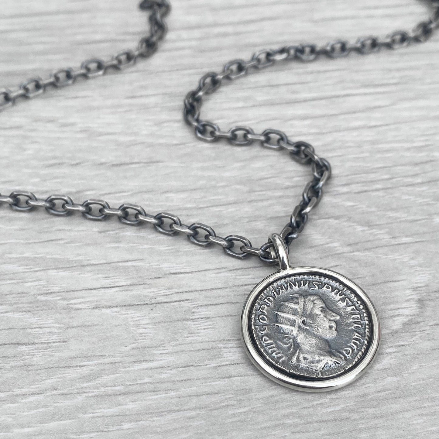 Oxidised solid Sterling silver 23mm replica Roman coin circle framed pendant on a choice of trace or round box chain