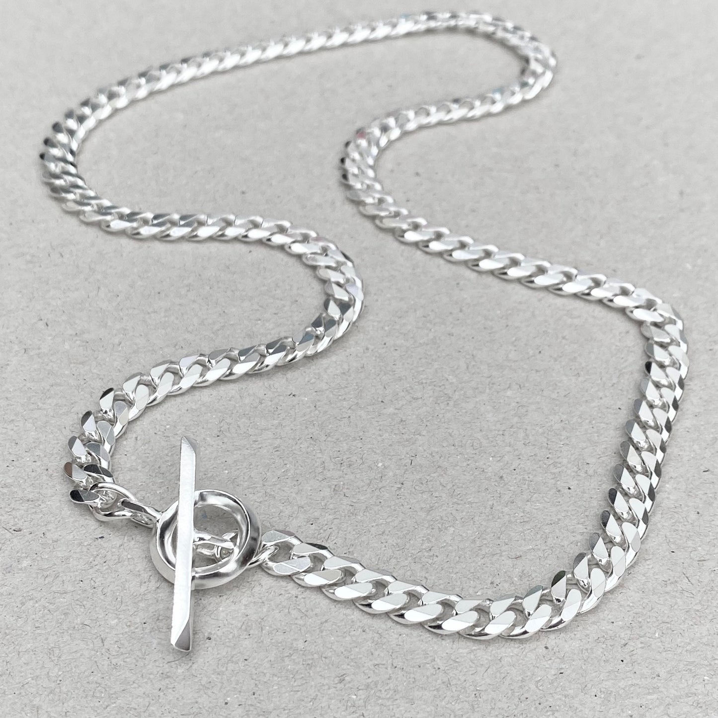 Solid silver heavy 6.6mm wide curb chain with a unique T bar and loop design - Oxidised or polished