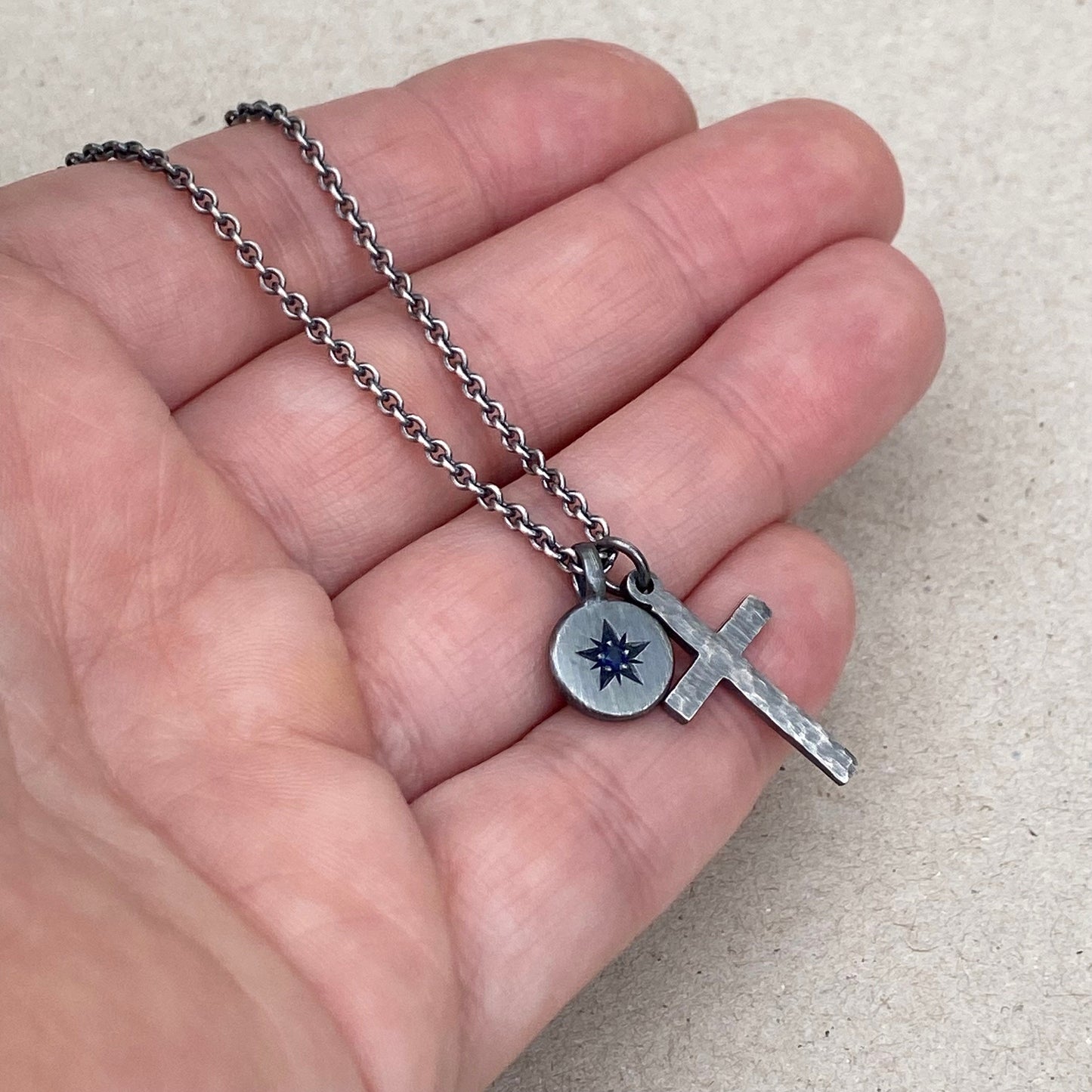 Oxidised silver star engraved birthstone 10mm pendant and hammered cross on tight trace chain