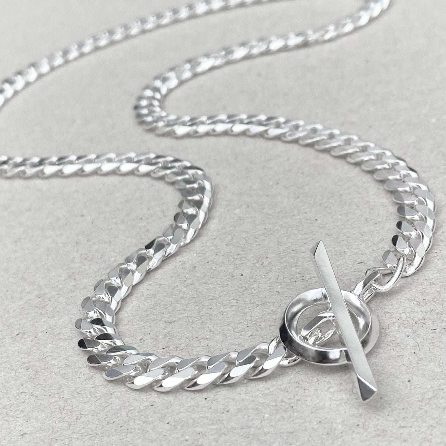 Solid silver heavy 6.6mm wide curb chain with a unique T bar and loop design - Oxidised or polished