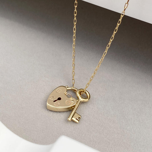 9ct solid yellow gold heart padlock and small key charm pendants on a trace chain
