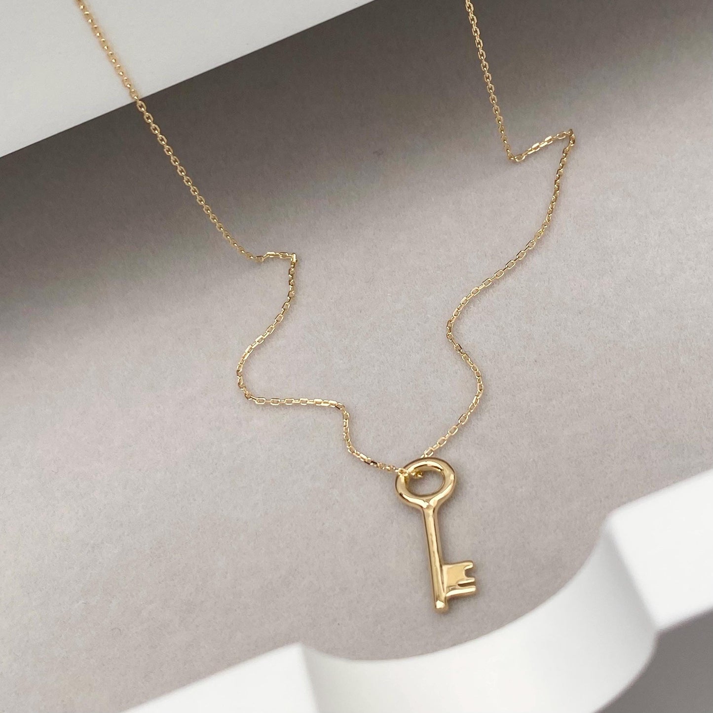 18ct solid yellow gold small and dainty key charm pendant and chain