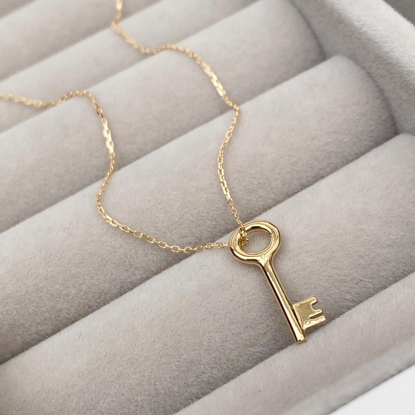 18ct solid yellow gold small and dainty key charm pendant and chain