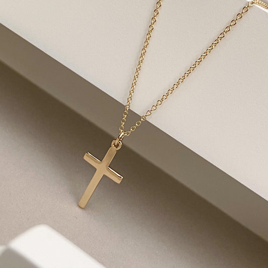 9ct solid yellow gold small cross pendant on a 1.2mm wide trace chain