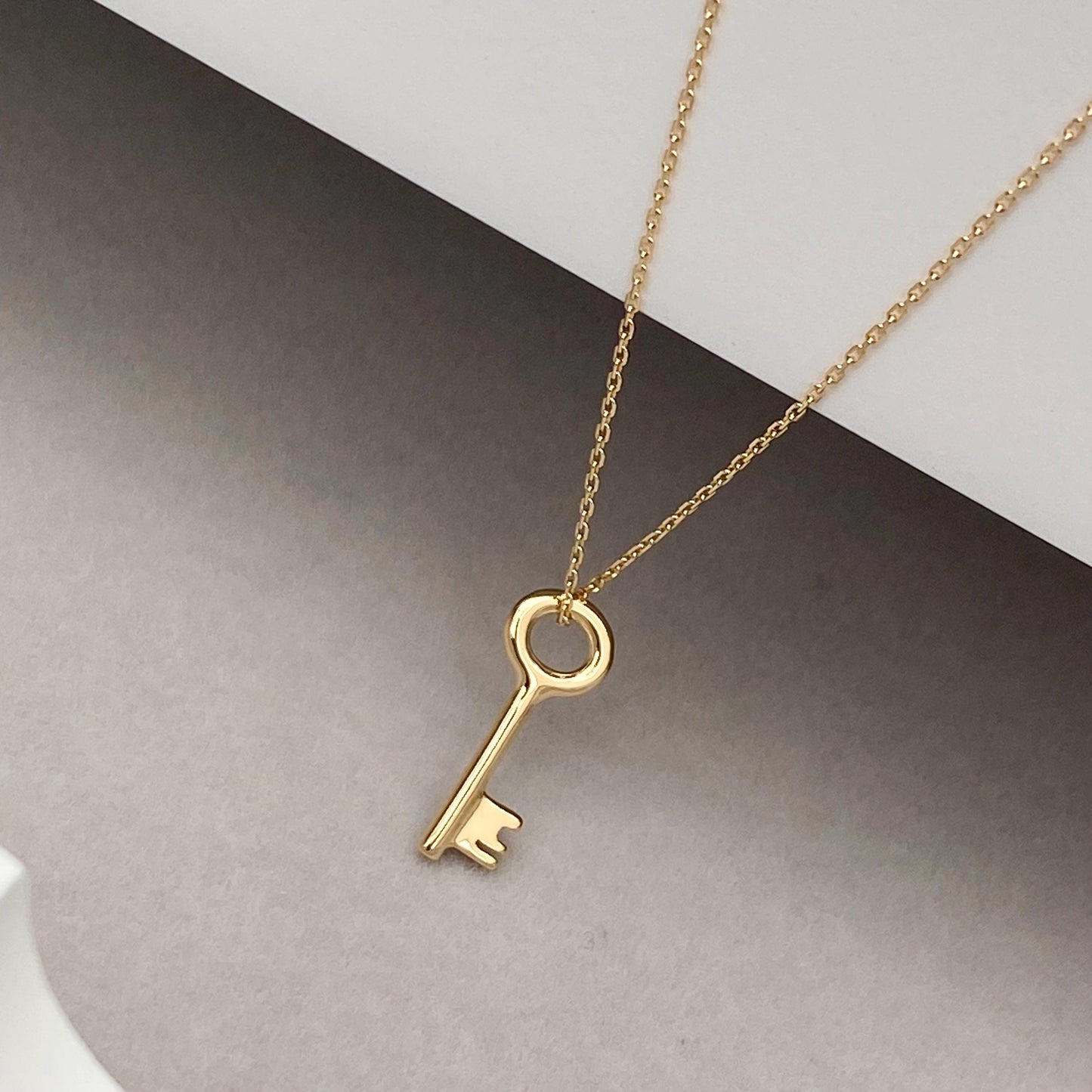 18ct solid yellow gold small and dainty key charm pendant and chain