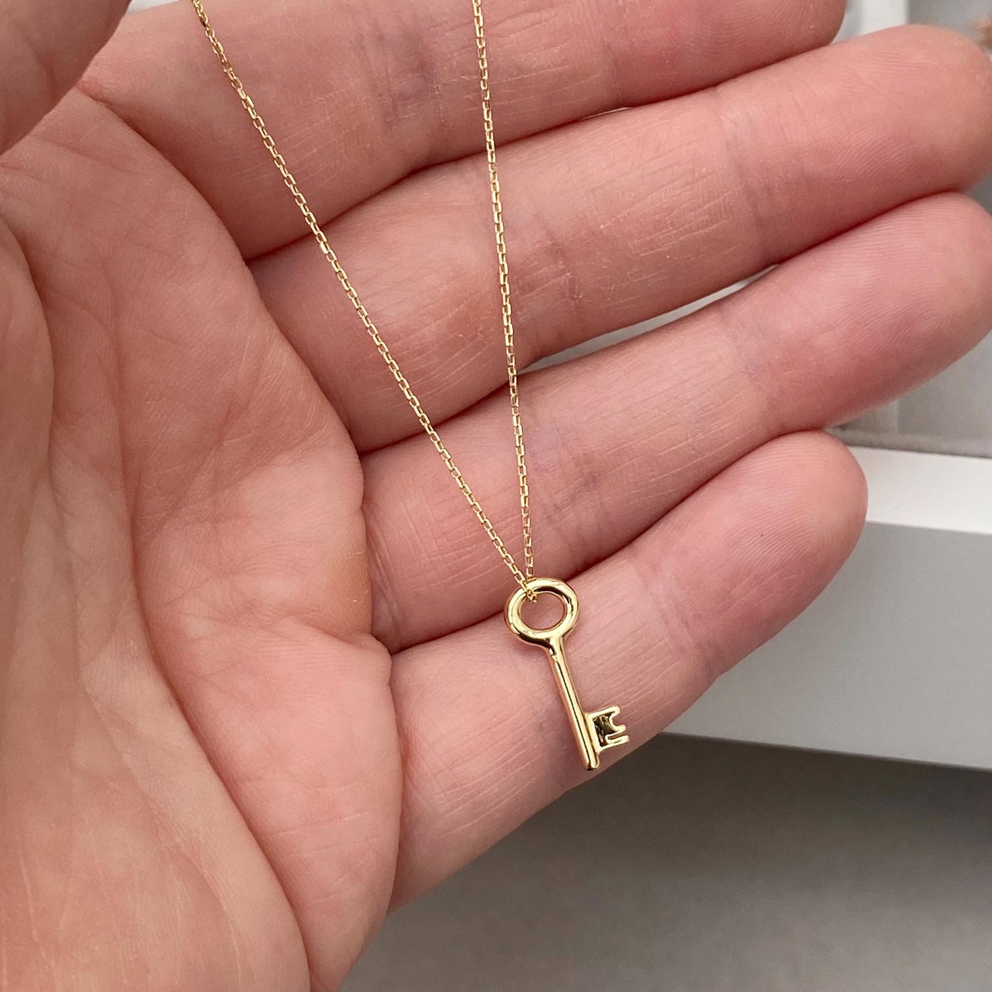 18ct solid yellow gold small and dainty key charm pendant and chain
