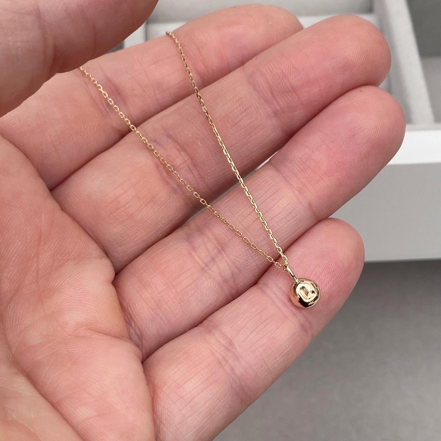 Handmade 9ct yellow, white or rose gold tiny letter nugget charm pendant on a fine trace chain