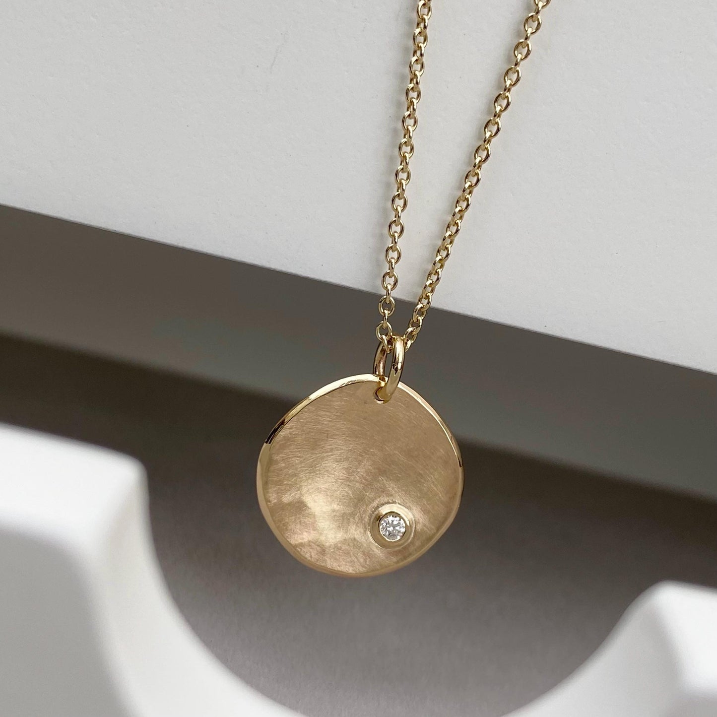 Handmade 9ct yellow, rose or white gold 16mm petal pendant with a 2mm natural diamond on a trace chain