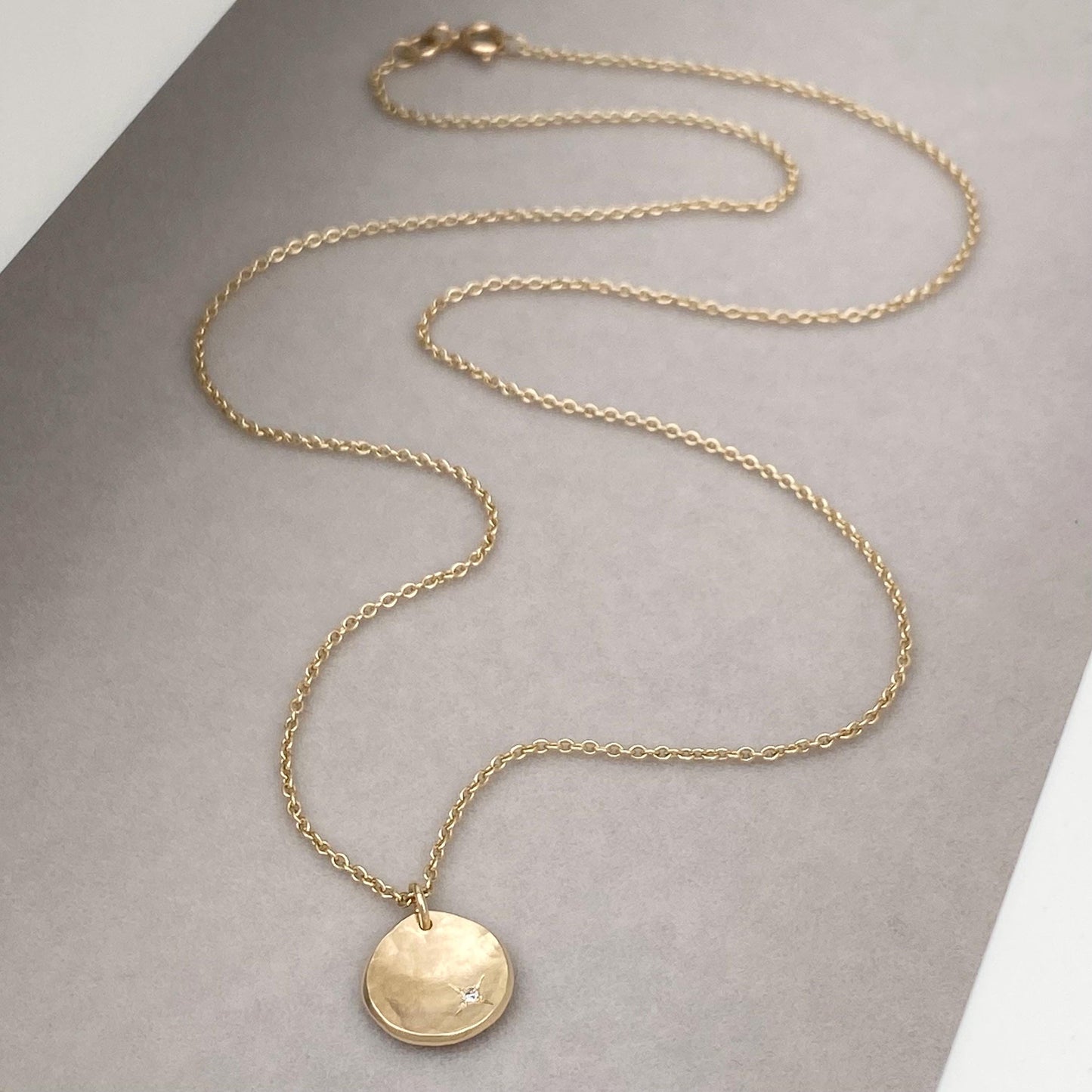 Handmade 9ct solid yellow, rose or white gold 10mm petal charm pendant with a 1.2mm diamond kiss on trace chain