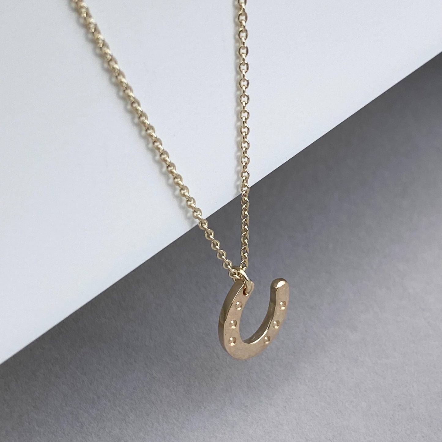 Handmade 9ct solid yellow, rose or white gold lucky horse shoe charm pendant on a trace chain