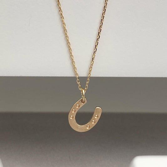 Handmade 9ct solid yellow, rose or white gold dainty lucky horse shoe charm pendant on a fine trace chain