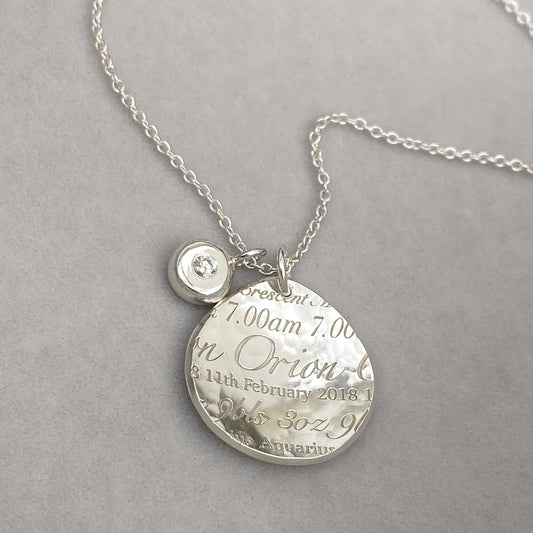 Handmade and personalised solid silver 19mm baby birth charm details pendant on a trace chain with diamond nugget charm