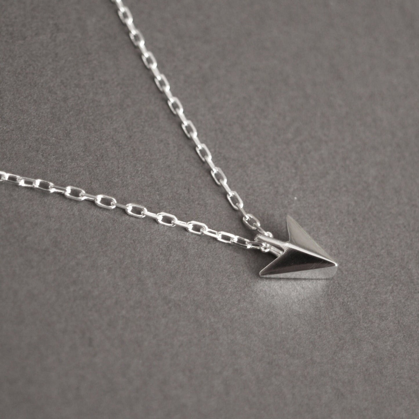 Oxidised or polished solid sterling silver small arrow pendant and diamond cut trace chain