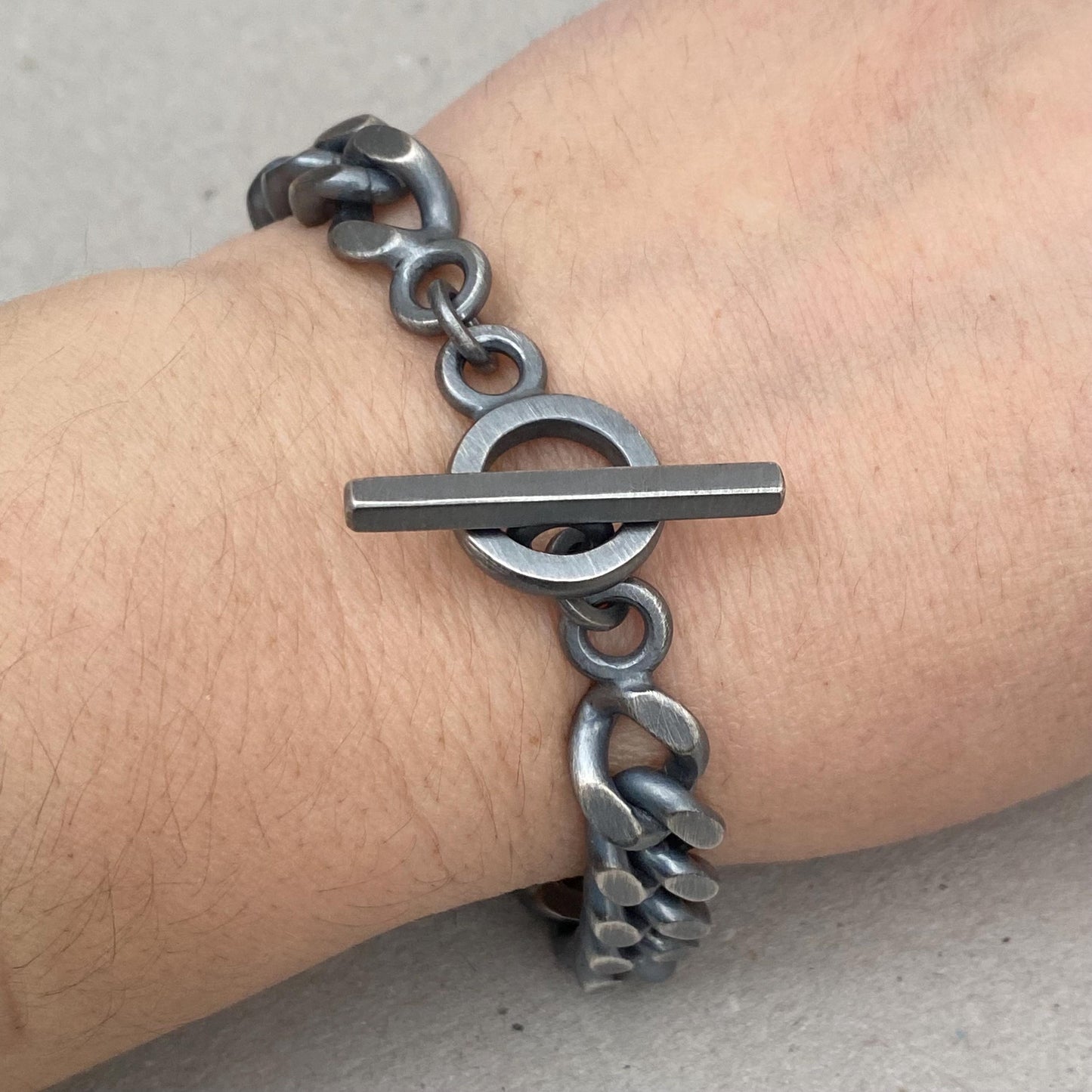 Oxidised solid silver 10.4mm wide heavy filed curb chain bracelet with a handmade T-bar