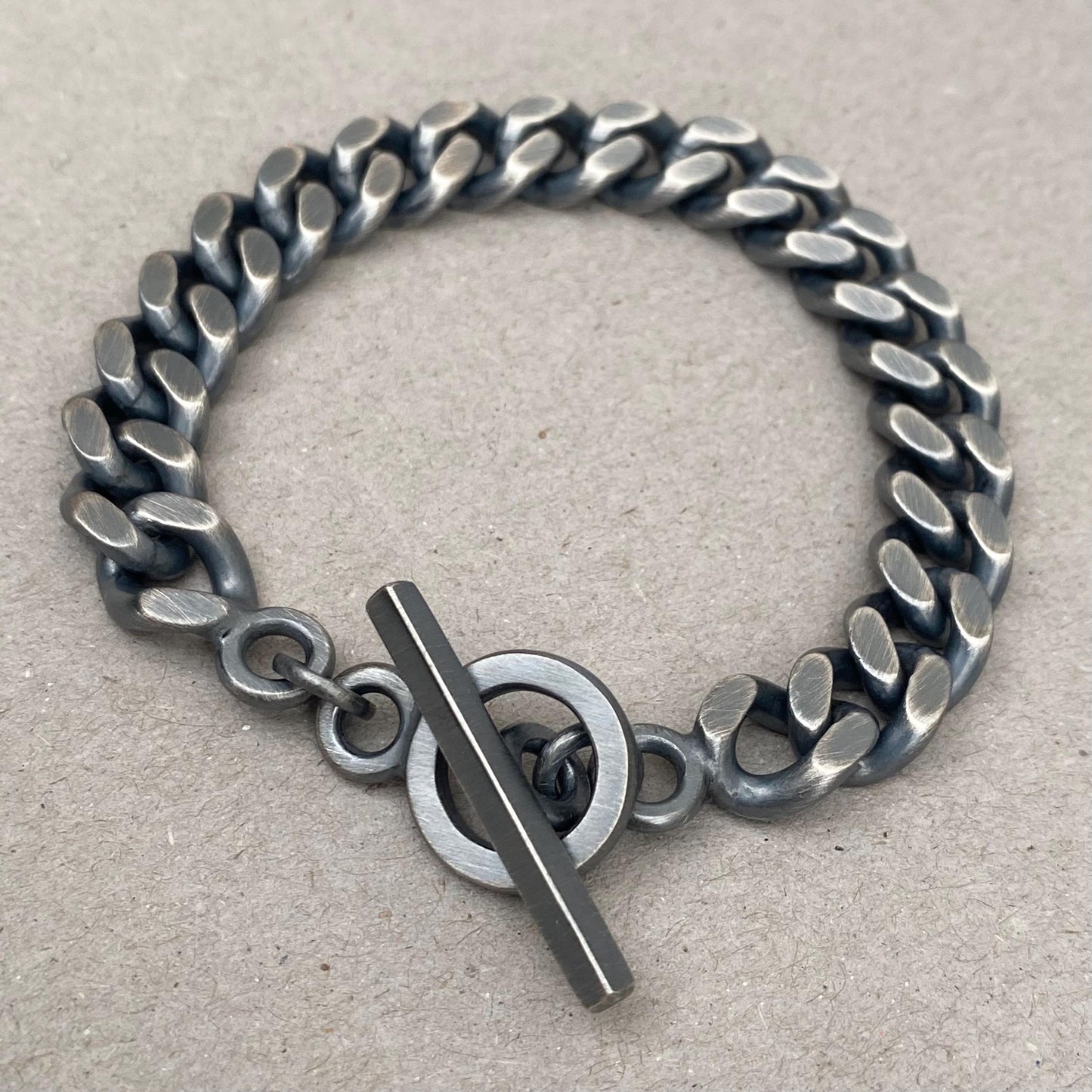 Oxidised solid silver 10.4mm wide heavy filed curb chain bracelet with a handmade T-bar