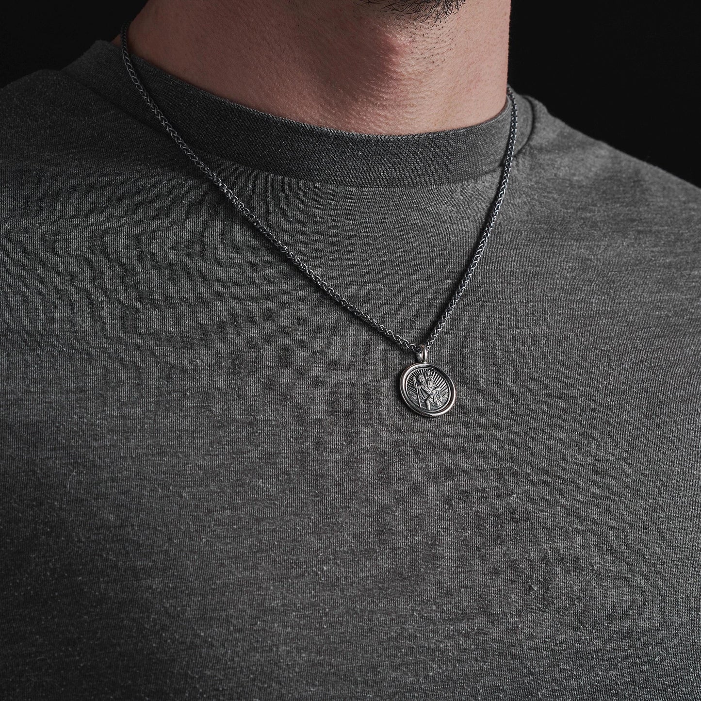 Oxidised solid silver round Saint Christopher framed pendant on a 2.5mm wide spiga chain