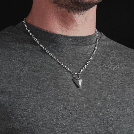 Oxidised or polished solid silver large arrow and loop detail pendant on a diamond cut trace chain
