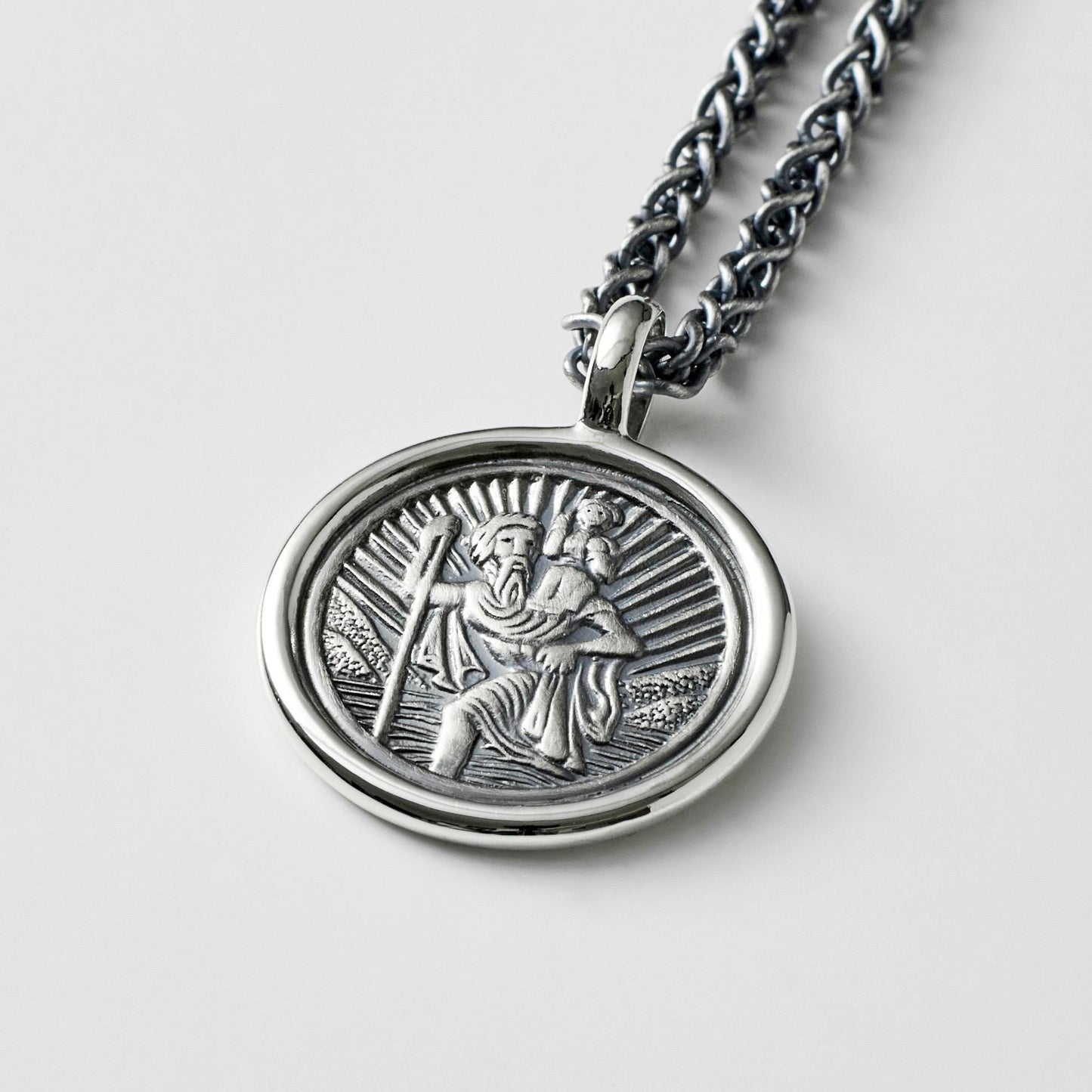 Oxidised solid silver round Saint Christopher framed pendant on a 2.5mm wide spiga chain