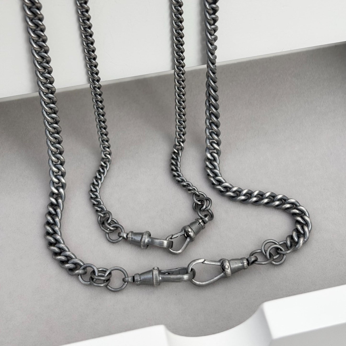 Oxidised or polished sterling silver rounded curb chain with two Albert swivel clasps