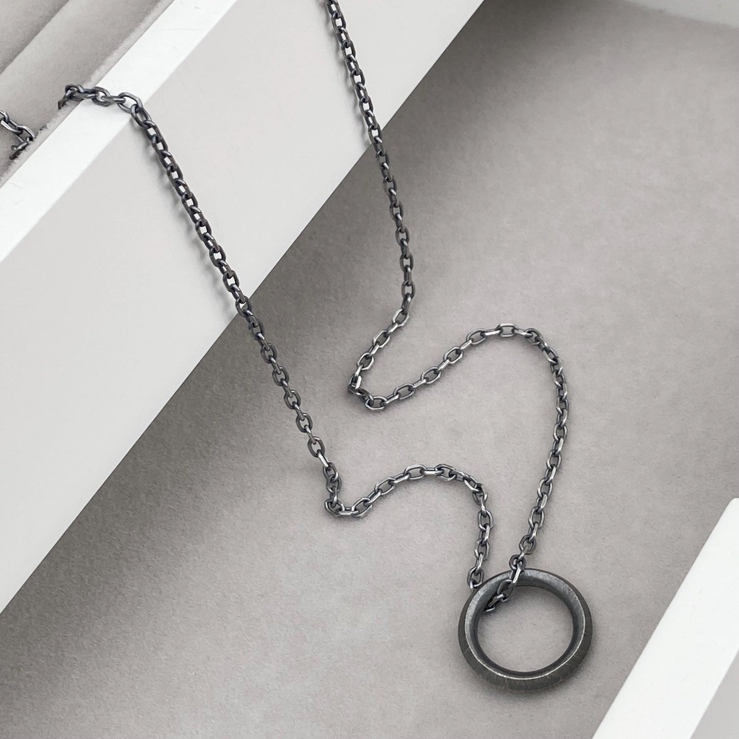 New listing - Oxidised or polished solid sterling silver unique ring design pendant on a diamond cut trace chain