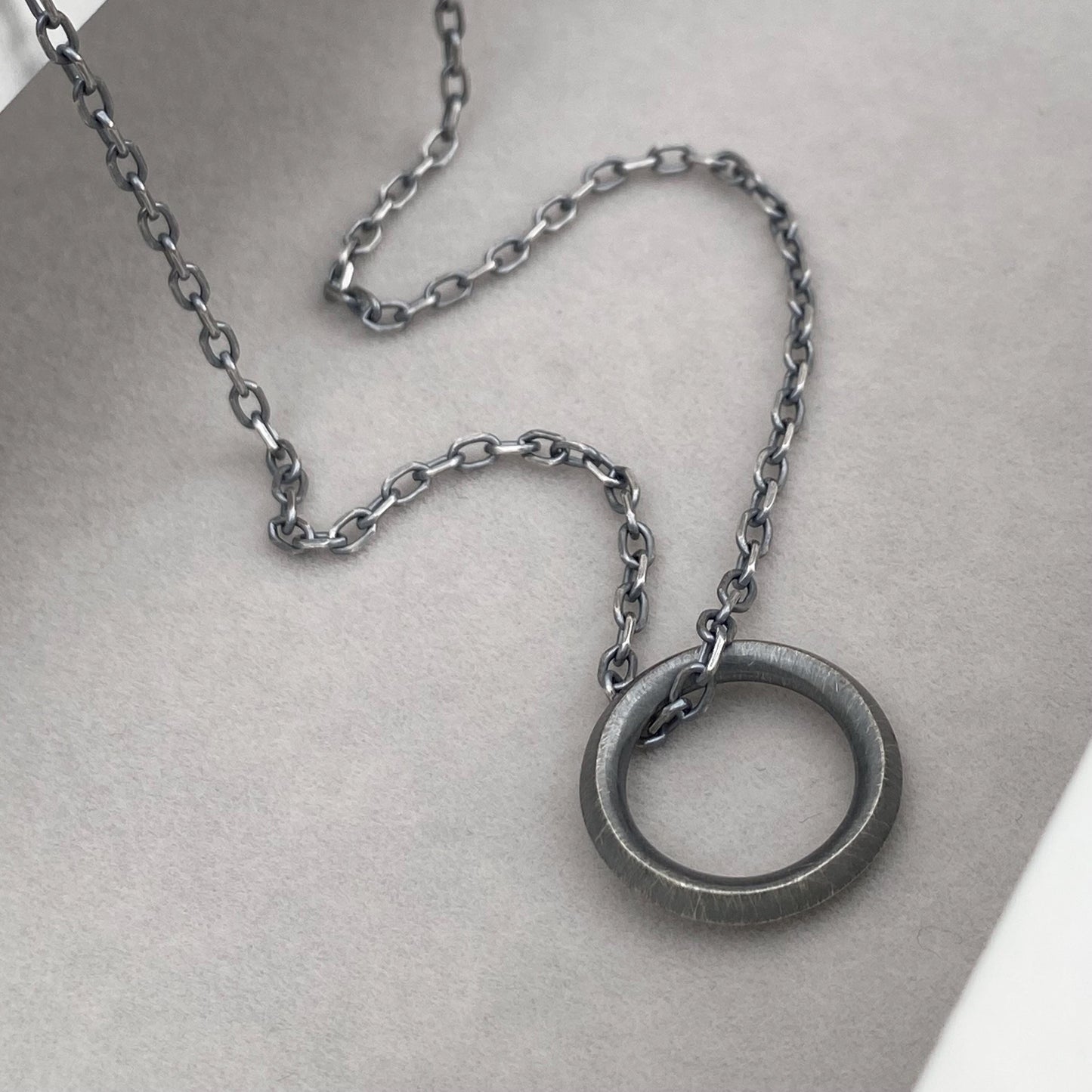 New listing - Oxidised or polished solid sterling silver unique ring design pendant on a diamond cut trace chain