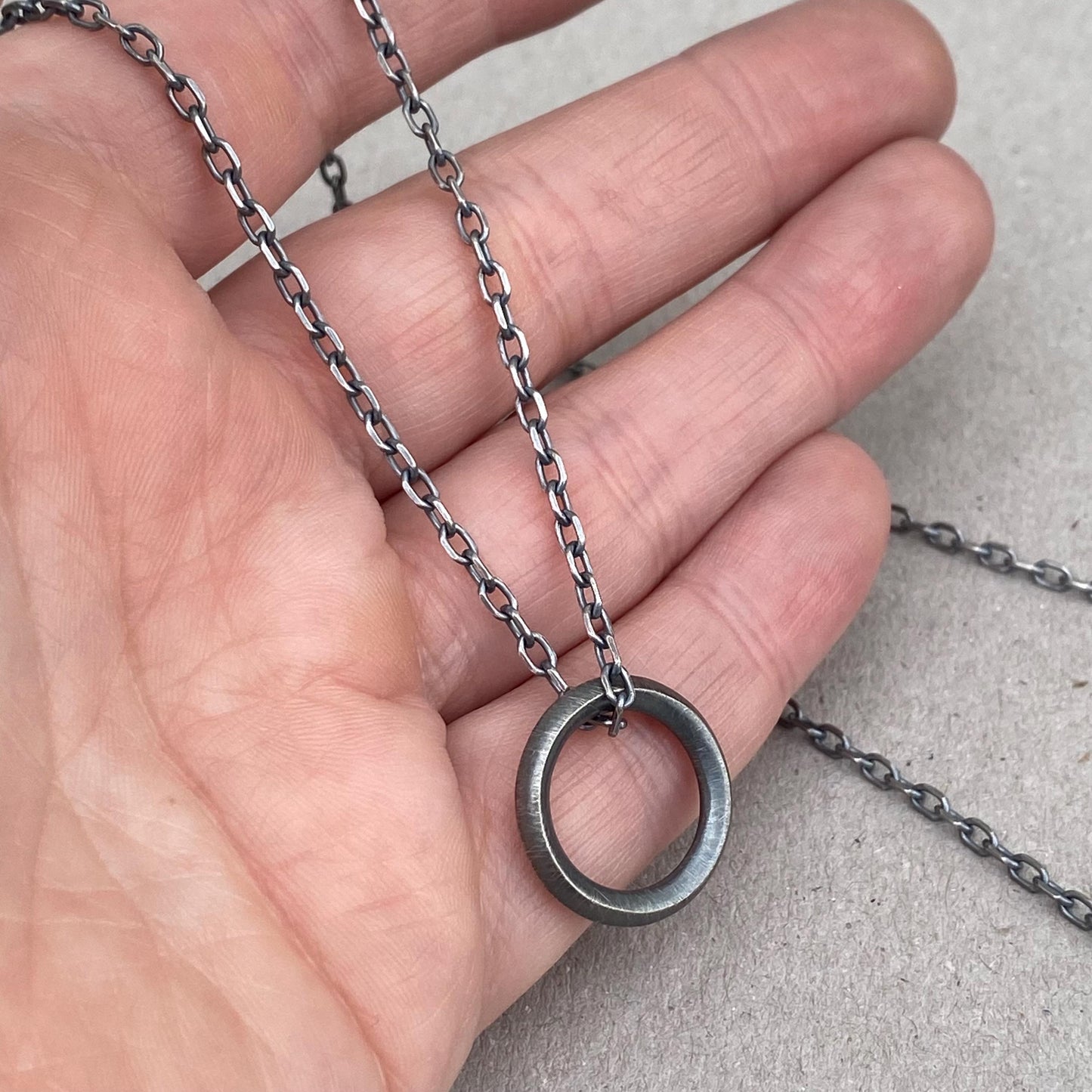 New listing - Oxidised or polished solid sterling silver unique ring design pendant on a diamond cut trace chain