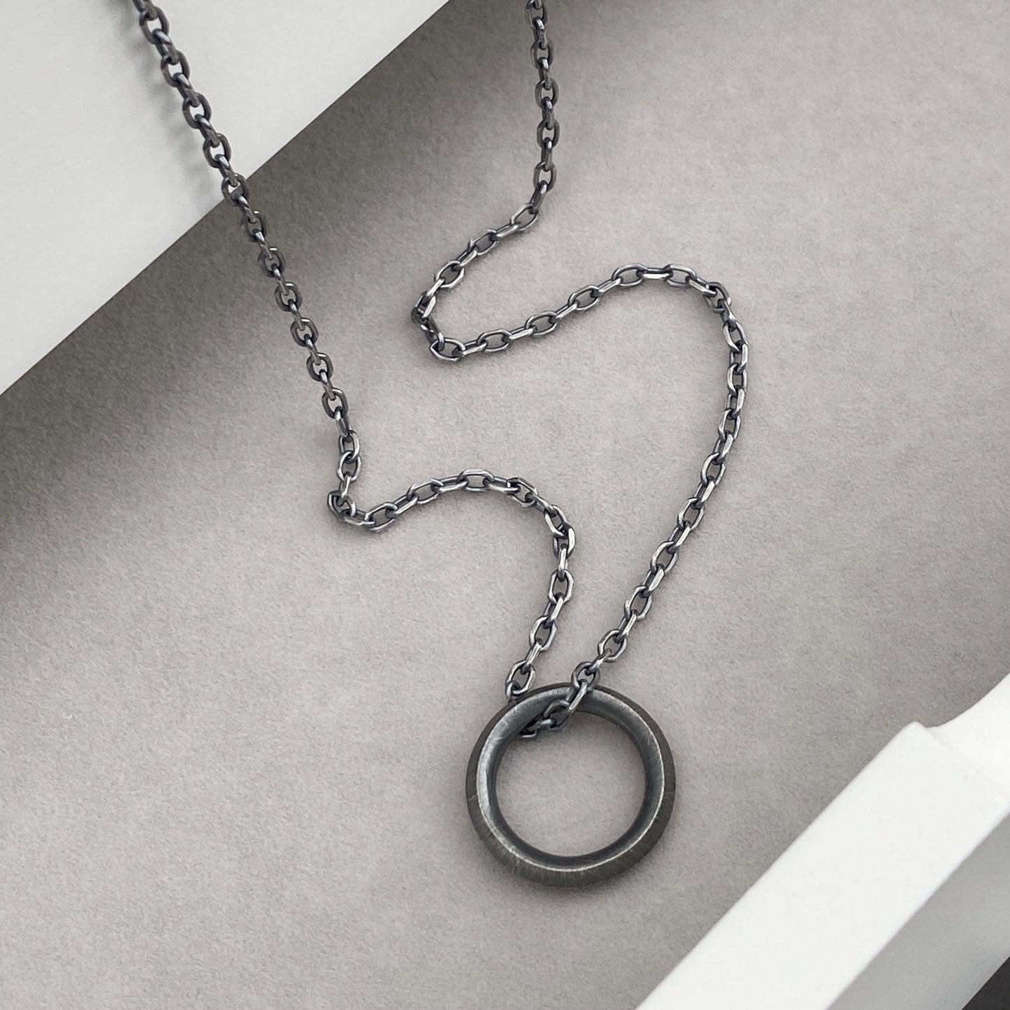 New listing - Oxidised or polished solid sterling silver unique ring design pendant on a diamond cut trace chain