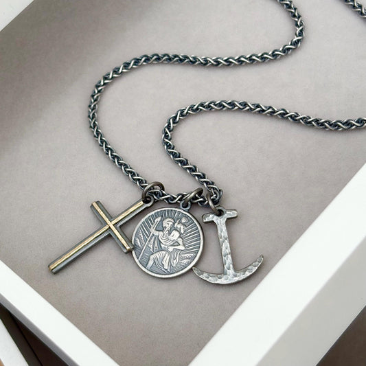 Oxidised solid sterling silver cross, saint christopher and anchor charm pendants on a spiga chain