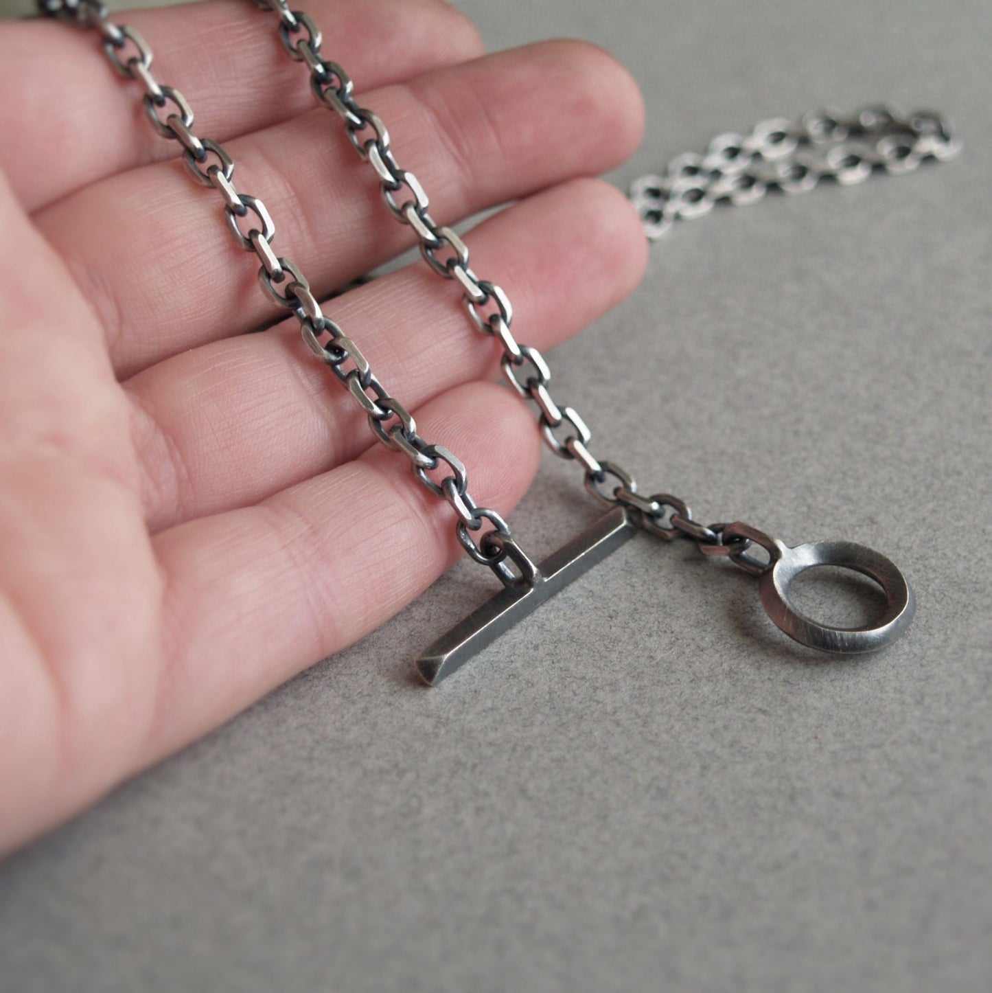 Oxidised or polished solid silver 4.2mm wide diamond cut trace chain with a unique T-bar design