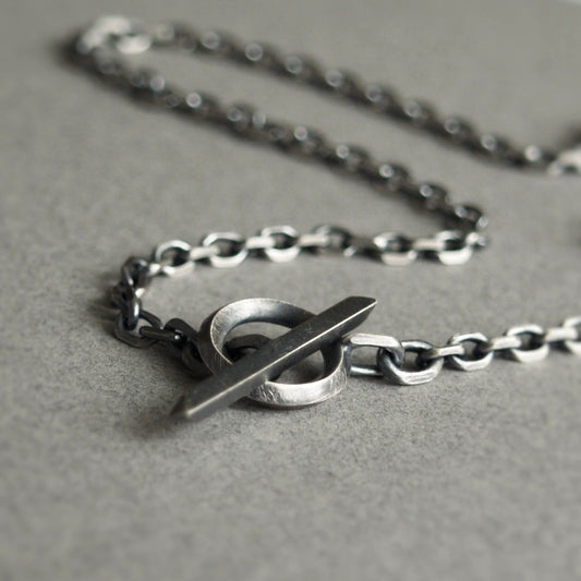 Oxidised or polished solid silver 4.2mm wide diamond cut trace chain with a unique T-bar design